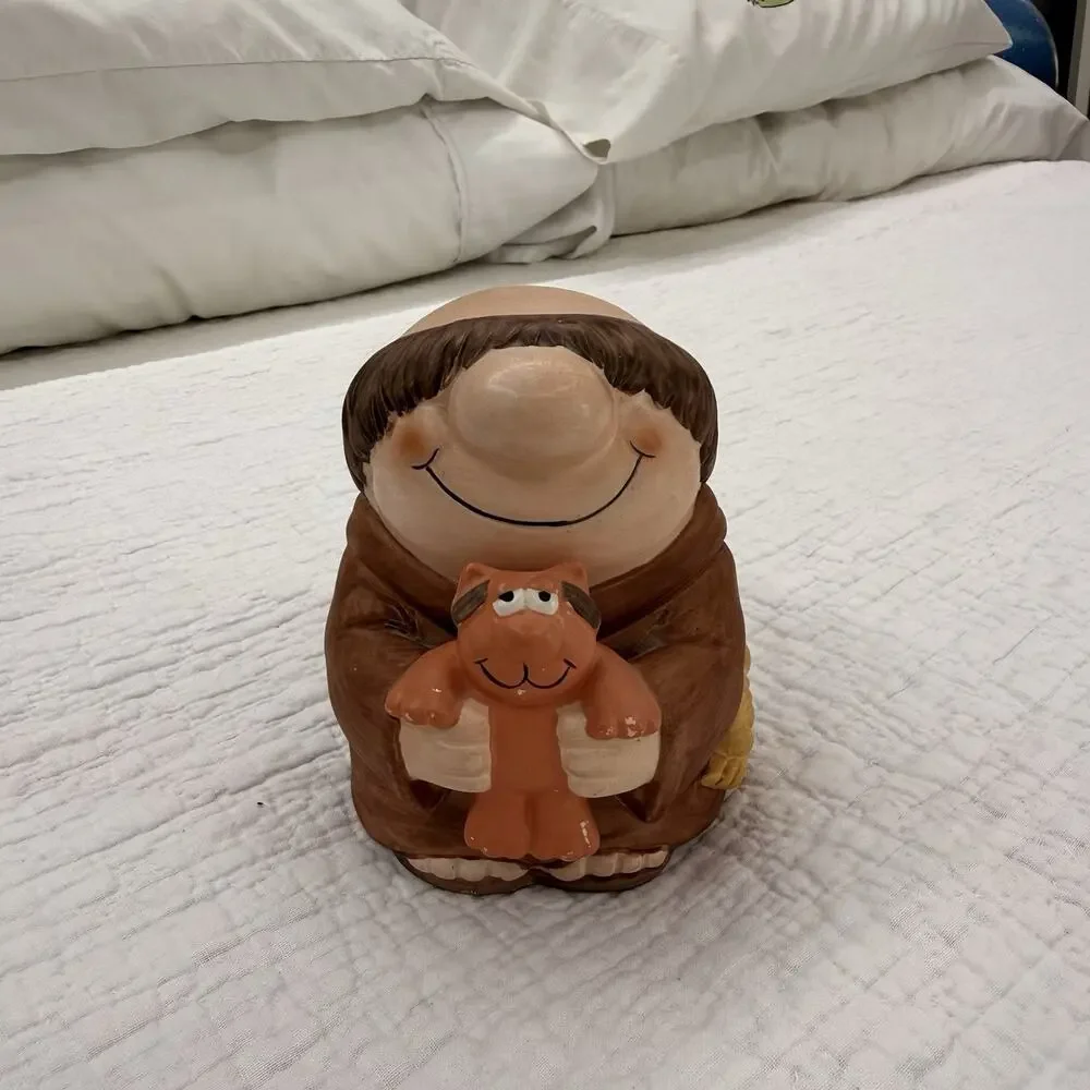 Wind-Up Ziggy Cartoon Figurine Smiling Padre Holding Dog Ceramic/Wood Brown